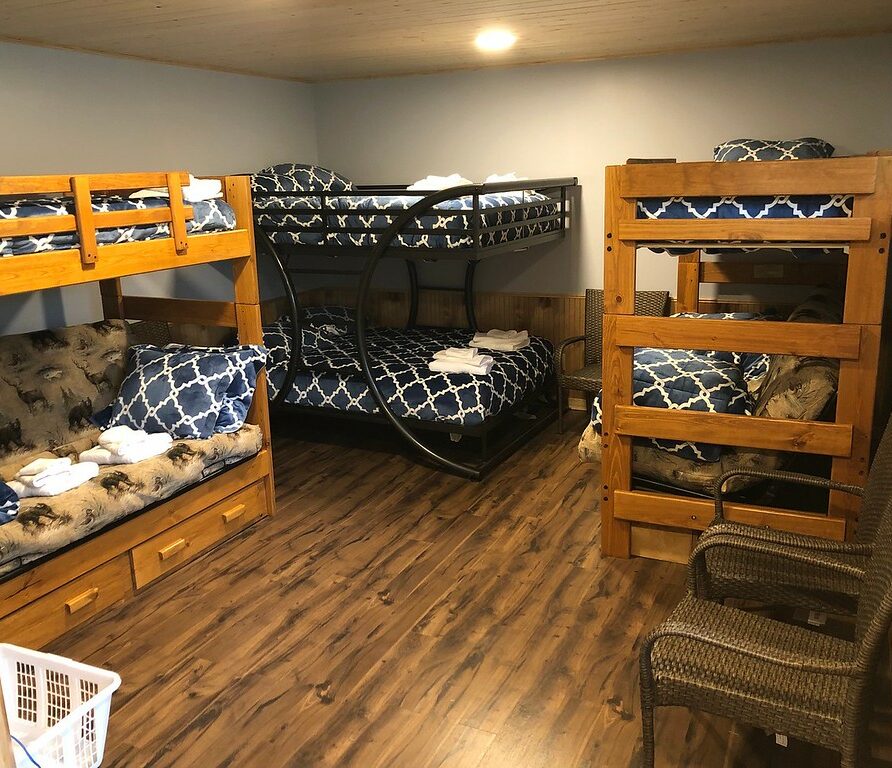 Large bunk room with 6 beds total